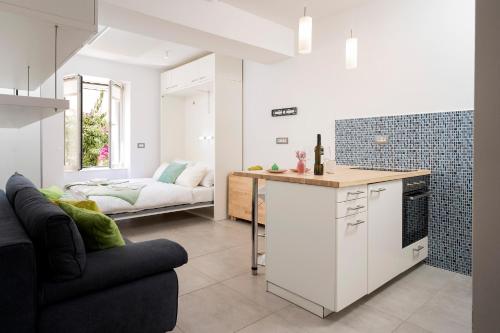 Η κουζίνα ή μικρή κουζίνα στο Clock Tower Apartment - ZF Hvar Center