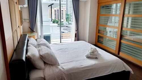 En eller flere senge i et værelse på 6D-3bedrooms35bathdowntown Bangkok Near BtsMrt