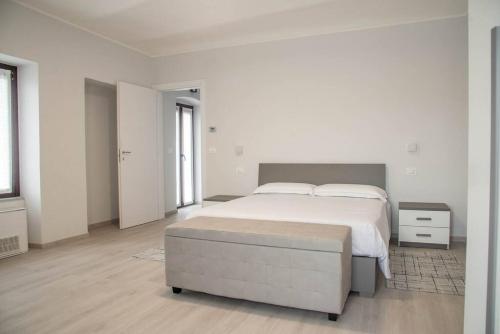 Ένα ή περισσότερα κρεβάτια σε δωμάτιο στο Casa Borgogno