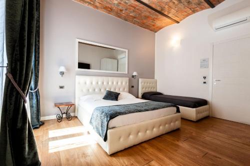 Cama o camas de una habitación en B&B Chez Moi