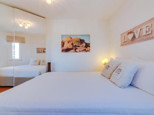 Postel nebo postele na pokoji v ubytování AL - Apartamento Algardia Mar