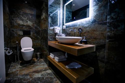 Salle de bains dans l'établissement Hotel Olsi