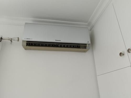 a air conditioner sitting on top of a ceiling at Alexia Room in Funchal