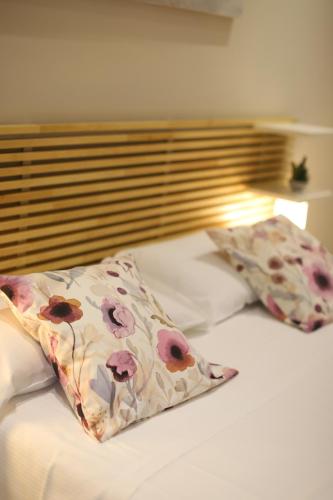 Postel nebo postele na pokoji v ubytování Maison Aphrodite