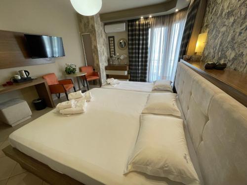 Katil atau katil-katil dalam bilik di Porto Del Sol Hotel