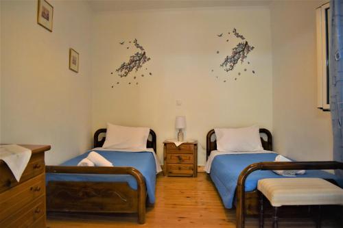 Postel nebo postele na pokoji v ubytování KATINA HOUSE