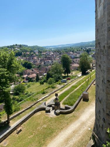 a view of a city from the tower of a castle at Domaine Les Hauts Prés in Villaines-les-Prévôtes