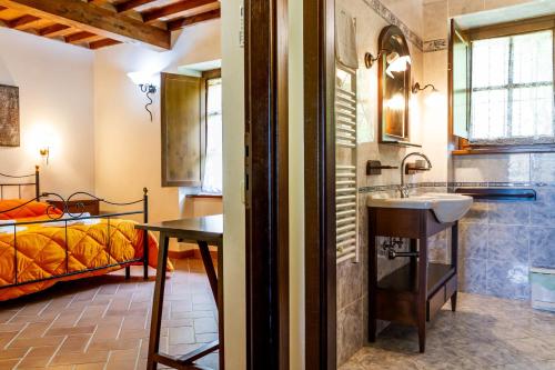 A bed or beds in a room at Casa Vacanza Il Carpignone 1