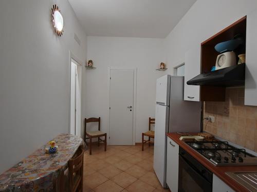 Kuchyň nebo kuchyňský kout v ubytování villa xenia