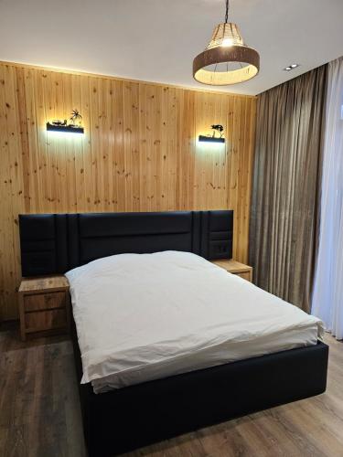 En eller flere senger på et rom på Luxury Eco Villa