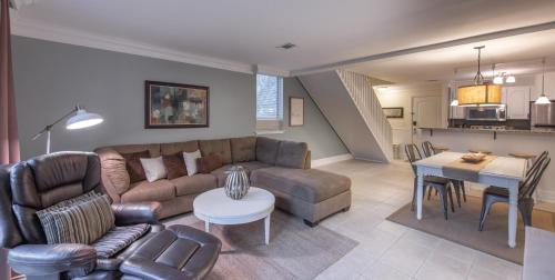 a living room with a couch and a table at Villas by the Sea Resort & Conference Center in Jekyll Island