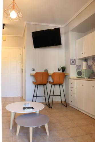 Kuchyň nebo kuchyňský kout v ubytování Olive Apartment