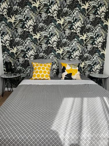 Postel nebo postele na pokoji v ubytování Douai 2: joli appartement face à la gare