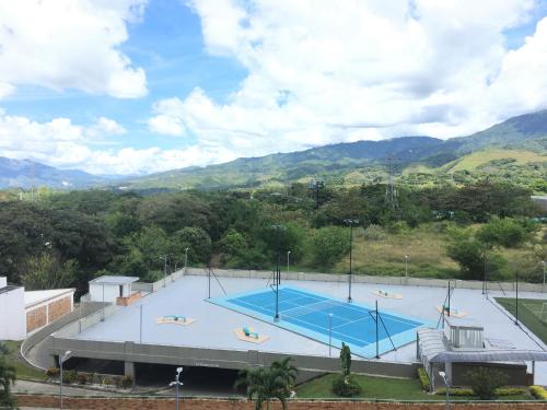 a large swimming pool on top of a building at Casa Lucy in Ibagué