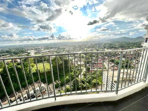 a balcony with a view of a city at Home Away From Home In Taiping - Newly Upgraded! in Taiping