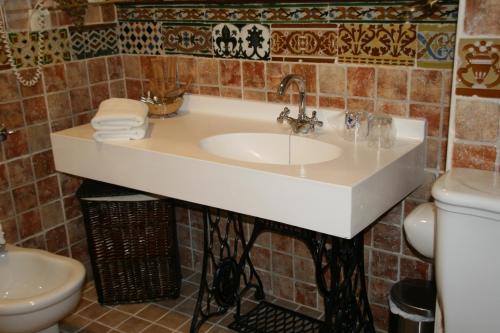 Een badkamer bij Hotel Convento La Gloria