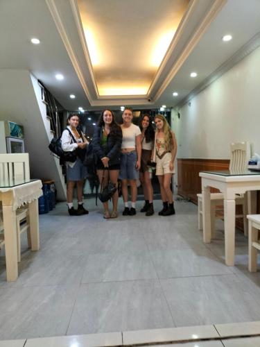 a group of women standing in a room at Căn hộ Sao Mai - Nội Bài Hà Nội in Hanoi