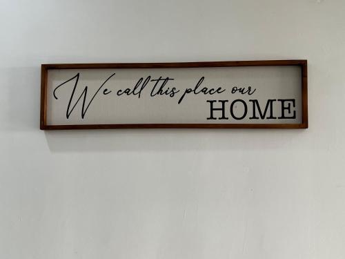 a sign that says we will this place our home on a wall at Home Away From Home In Taiping - Newly Upgraded! in Taiping
