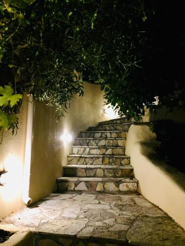 a set of stone stairs at night at The Cove Assos in Asos