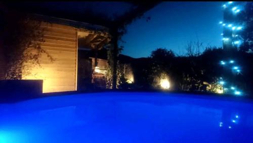 a view of a building at night with lights at Spring Gardens Retreat And Spa Private hottub,Sauna,Massage in Great Malvern