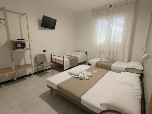 Postel nebo postele na pokoji v ubytování SOMA