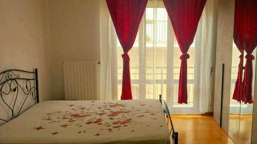 Postel nebo postele na pokoji v ubytování AMOROSO FAMILY