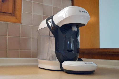 a mixer sitting on top of a kitchen counter at View of the Castle and the Sea 1 in Platamonas