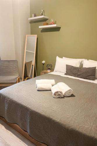 Posteľ alebo postele v izbe v ubytovaní 21st Street Comfy Studio