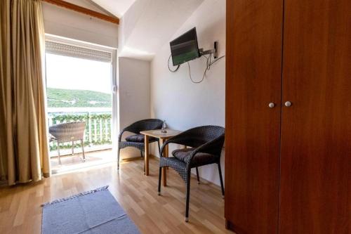 Телевизор и/или развлекательный центр в Apartments Ivona