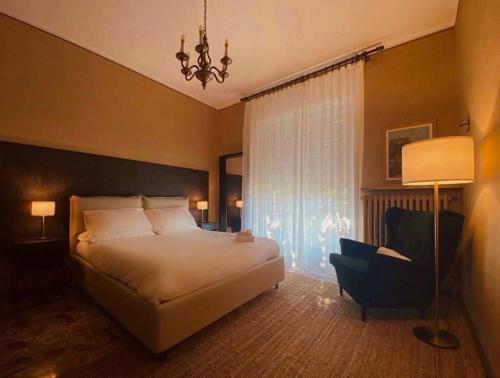 Postel nebo postele na pokoji v ubytování Alta Langa Suites