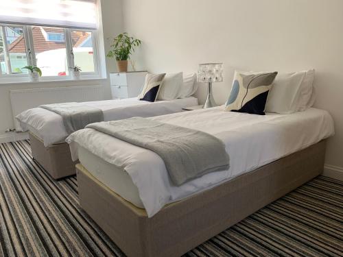 Ένα ή περισσότερα κρεβάτια σε δωμάτιο στο Villa Levante