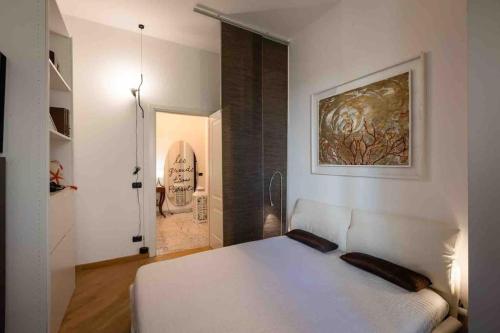 A bed or beds in a room at Nervi residenziale a due passi dal mare