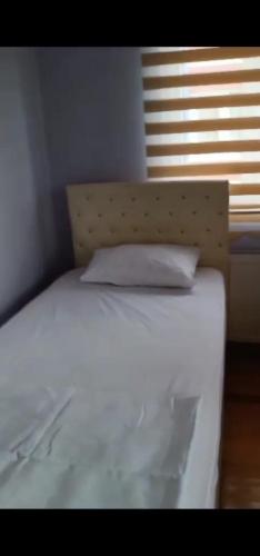 Postel nebo postele na pokoji v ubytování AYDIN APART