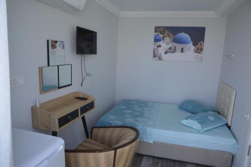 Katil atau katil-katil dalam bilik di Ege Apart & Hotel