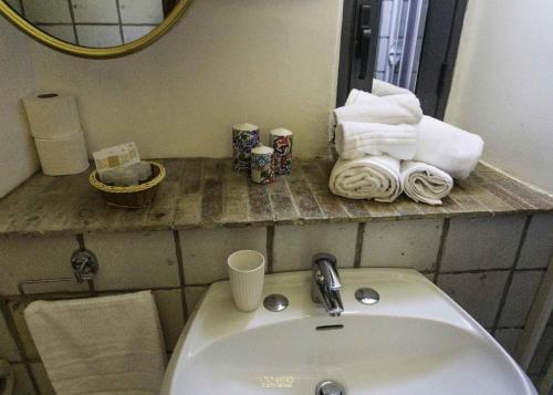 Koupelna v ubytování Olimpo Room