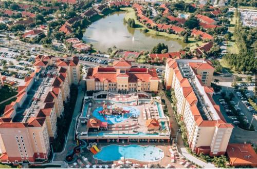 an aerial view of a resort with a swimming pool at One bedroom deluxe villa in Orlando