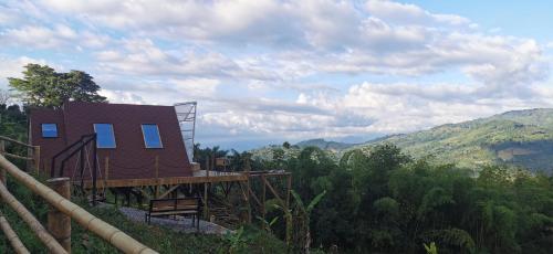 a house on top of a hill with a view at Glamping Villa Gilma in Sevilla