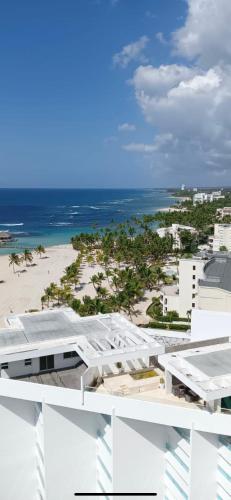 an aerial view of a beach and buildings at Marbella Juan dolio beach front luxury apartment in Juan Dolio