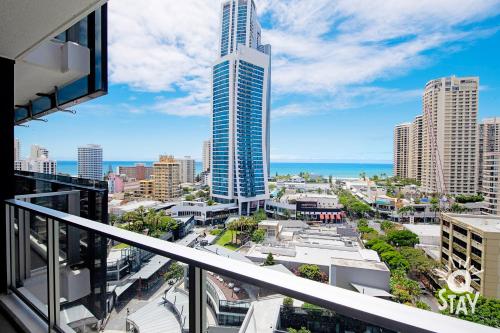 a view of a city from a balcony of a building at KIDS STAY FREE in OCEAN View 1 Bedroom SPA Apartment at Circle on Cavill - Q STAY in Gold Coast