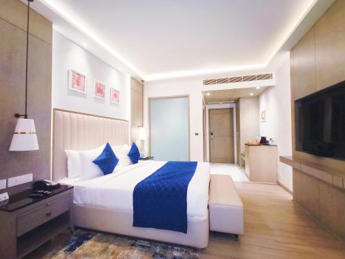 Postel nebo postele na pokoji v ubytování Mariton Hotel