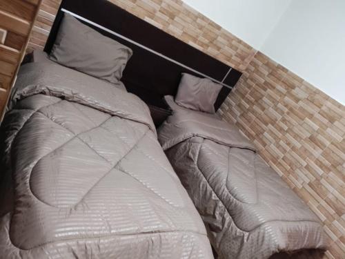 Postel nebo postele na pokoji v ubytování Dead sea 2 bedroom apartment in Astana ,swemeh Jordan