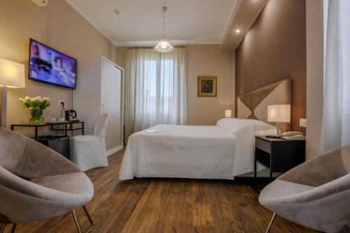 TV a/nebo společenská místnost v ubytování Albergo Alassio