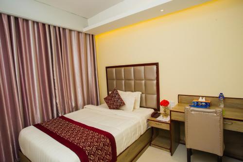 Postel nebo postele na pokoji v ubytování Hotel Mira Garden