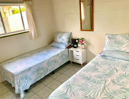 Postel nebo postele na pokoji v ubytování Muri Villas