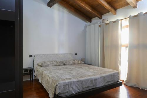Postel nebo postele na pokoji v ubytování Piccola Corte