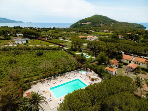 an aerial view of a villa with a swimming pool at Glamping at Elba in Lacona