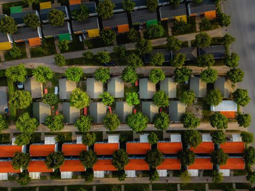 an overhead view of a parking lot with trees at Glamping Lake Garda in Peschiera del Garda