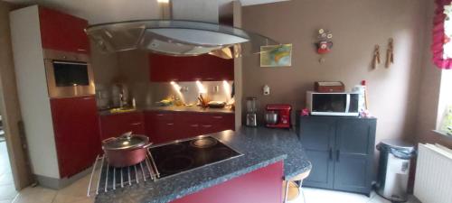 a kitchen with a sink and a counter top at spacious room with free parking in Almere