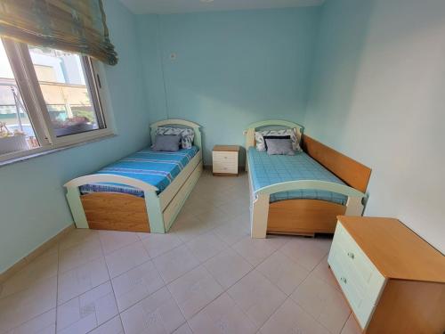 Postel nebo postele na pokoji v ubytování Beko - Apartment with sea view in Durres