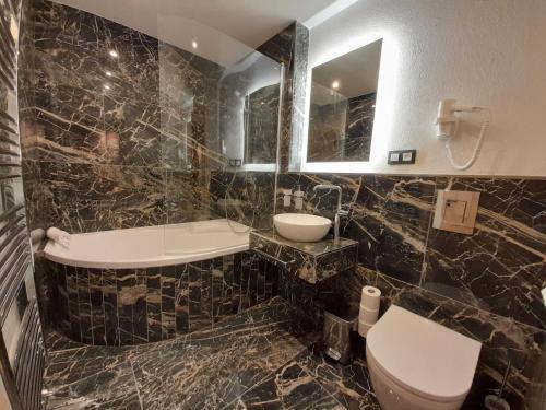Ένα μπάνιο στο Residence Tvrz Skočice